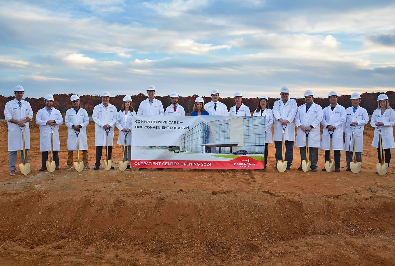 Providers and leaders pose at the groundbreaking of Mount Nittany Health Toftrees