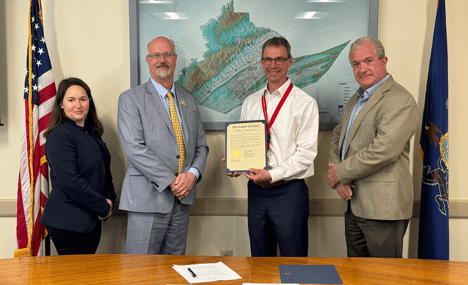Kurt Kissinger poses with the Center County Commissioners with the Mount Nittany Health Week proclamation